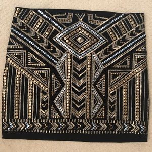 Mini skirt, with gold and silver sequins